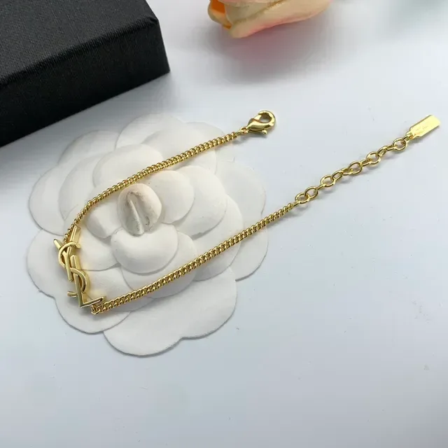 سوارات Saint Laurent Monogram ذهبي وفضي سلسلة 7