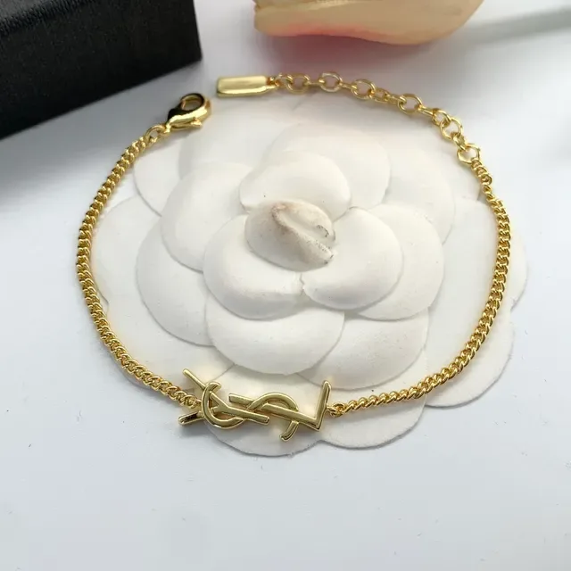 سوارات Saint Laurent Monogram ذهبي وفضي سلسلة 8