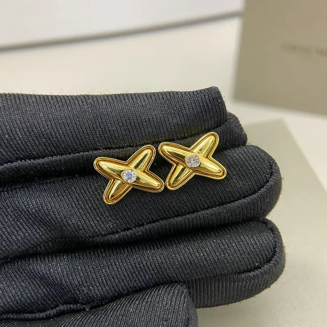 Tiffany & Co. Boucles d'oreilles en or et argent en forme de X 2