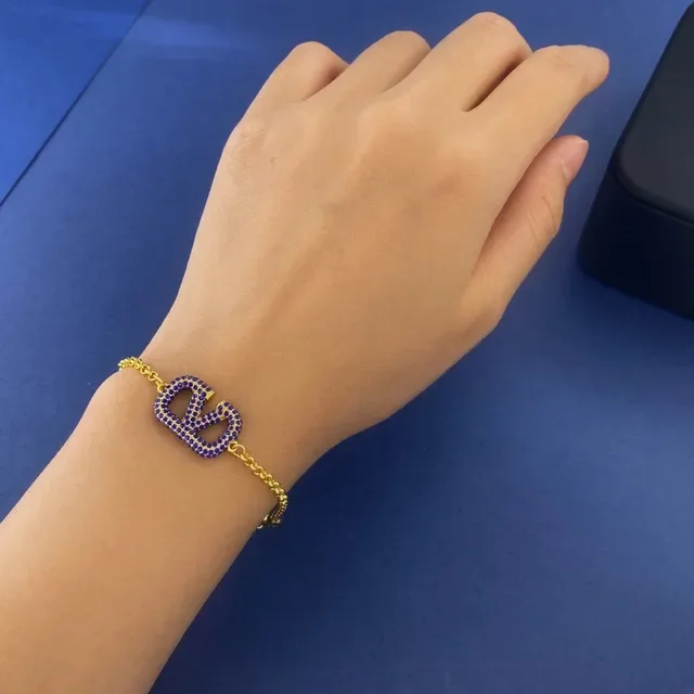 Valentino VLOGO Pavé Pulseira de Corrente Pedras Azuis Tonalidade Dourada 6