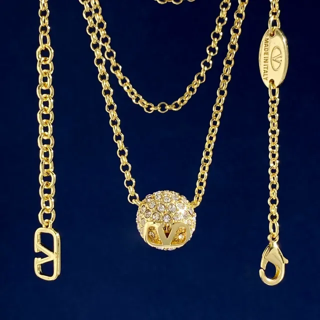 Valentino VLTN Gold Silver Pavé Crystal Earrings 3
