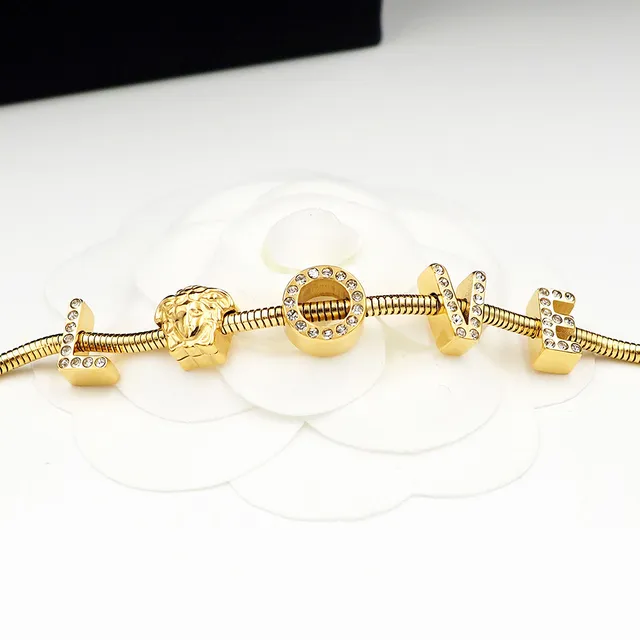 Versace Love Medusa सर्प चेन गोल्ड टोन ब्रेसलेट 7
