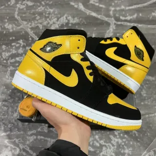 Air Jordan 1 黑黄高帮篮球鞋