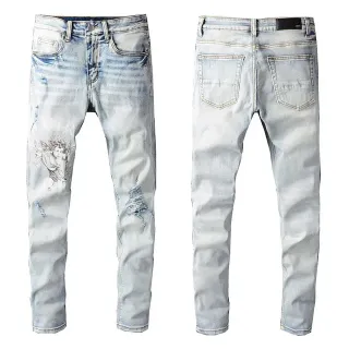 Amiri Pantalones Vaqueros Azules y Blancos Desgastados con Impresión Gráfica