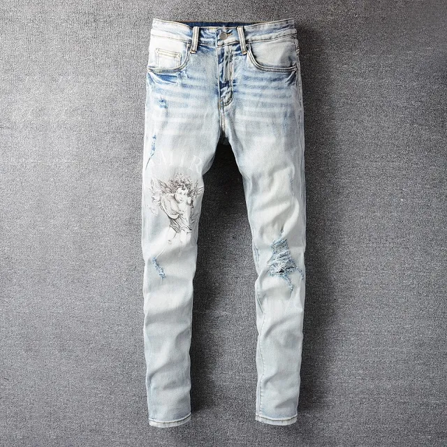Amiri Calças Jeans Azuis e Brancas Desgastadas com Estampa Gráfica 6