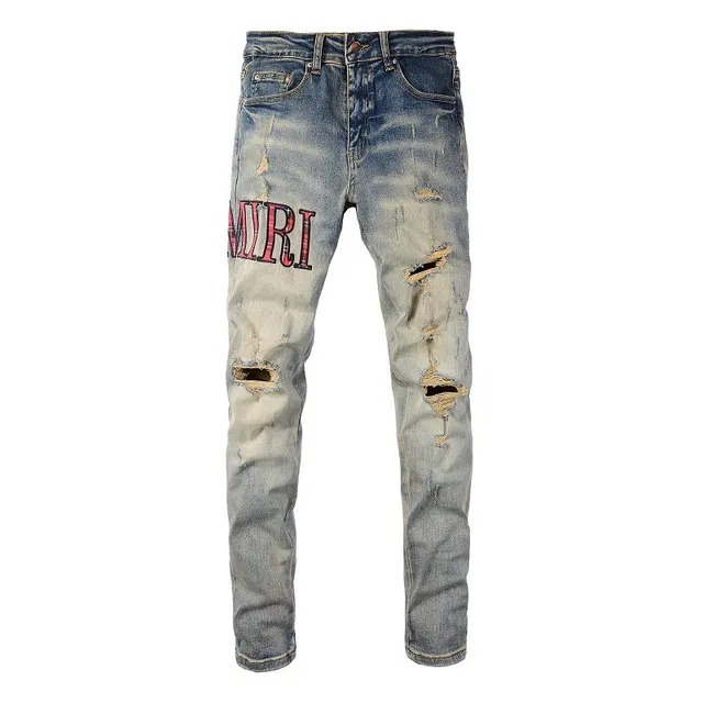 Amiri Pantalones Vaqueros Slim-Fit con Logo Distressed 2
