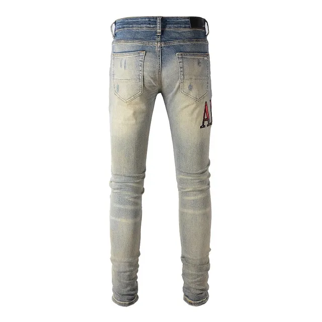 Amiri Pantalones Vaqueros Slim-Fit con Logo Distressed 3