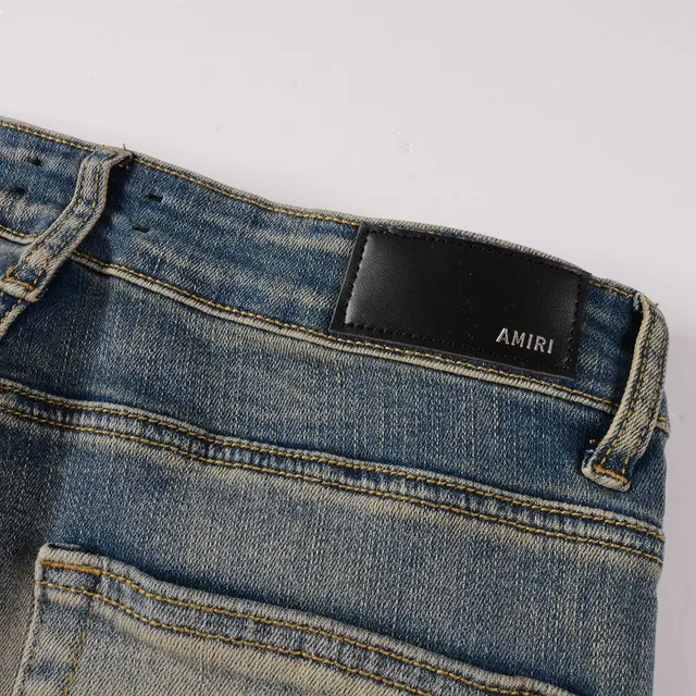 Amiri Pantalones Vaqueros Slim-Fit con Logo Distressed 8