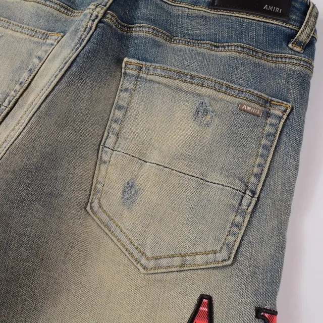 Amiri Pantalones Vaqueros Slim-Fit con Logo Distressed 9