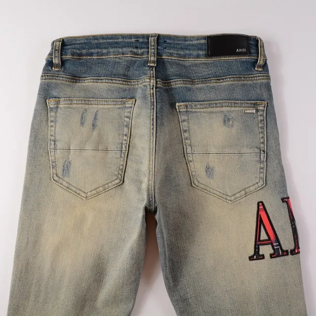 Amiri Pantalones Vaqueros Slim-Fit con Logo Distressed 10