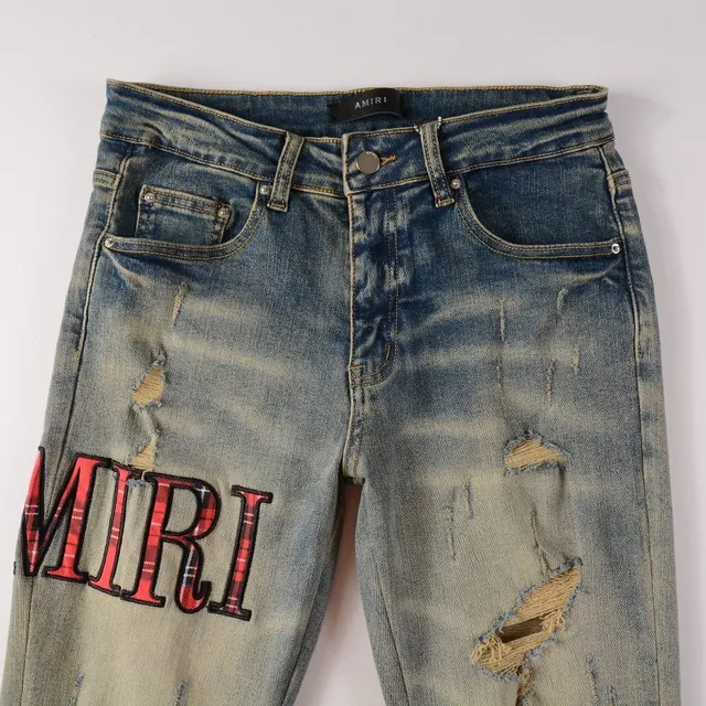 Amiri Pantalones Vaqueros Slim-Fit con Logo Distressed 16