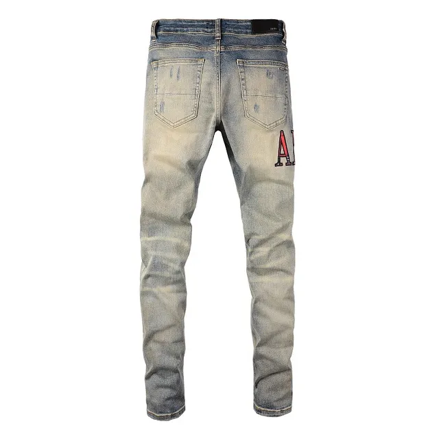 Amiri Pantalones Vaqueros Slim-Fit con Logo Distressed 18