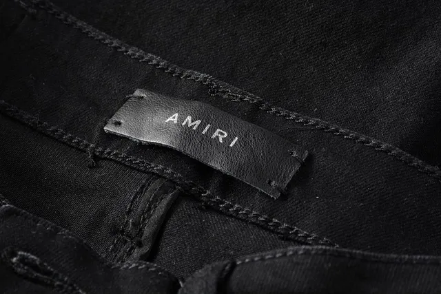 Amiri جينز موتو بانيل مفروك 13