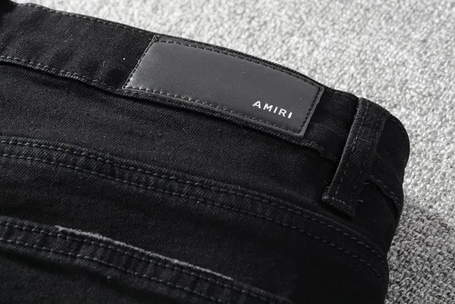Amiri جينز موتو بانيل مفروك 15