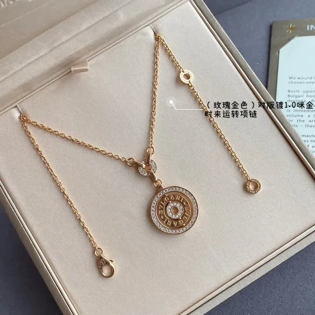 Bvlgari B.zero1 金银色 圆形旋转吊坠 帕维晶石镶边 项链 2