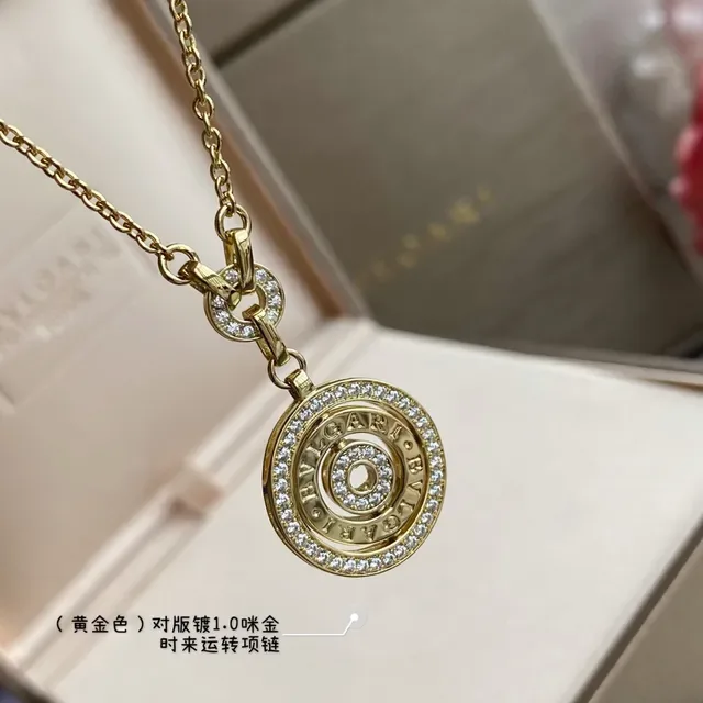 Bvlgari B.zero1 金银色 圆形旋转吊坠 帕维晶石镶边 项链 5