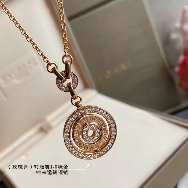 Bvlgari B.zero1 金银色 圆形旋转吊坠 帕维晶石镶边 项链 6