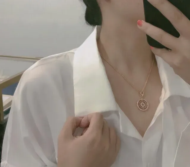 Bvlgari B.zero1 金银色 圆形旋转吊坠 帕维晶石镶边 项链 9