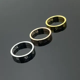 Cartier Love কালো ও সোনা/রুপো দ্বি-টোন চওড়া ব্যান্ডের আংটিগুলো