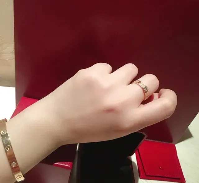 Cartier Red Gold Paved Diamond Bands Central Round Stone Ring 4
