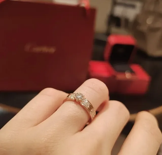 Cartier Red Gold Paved Diamond Bands Central Round Stone Ring 7