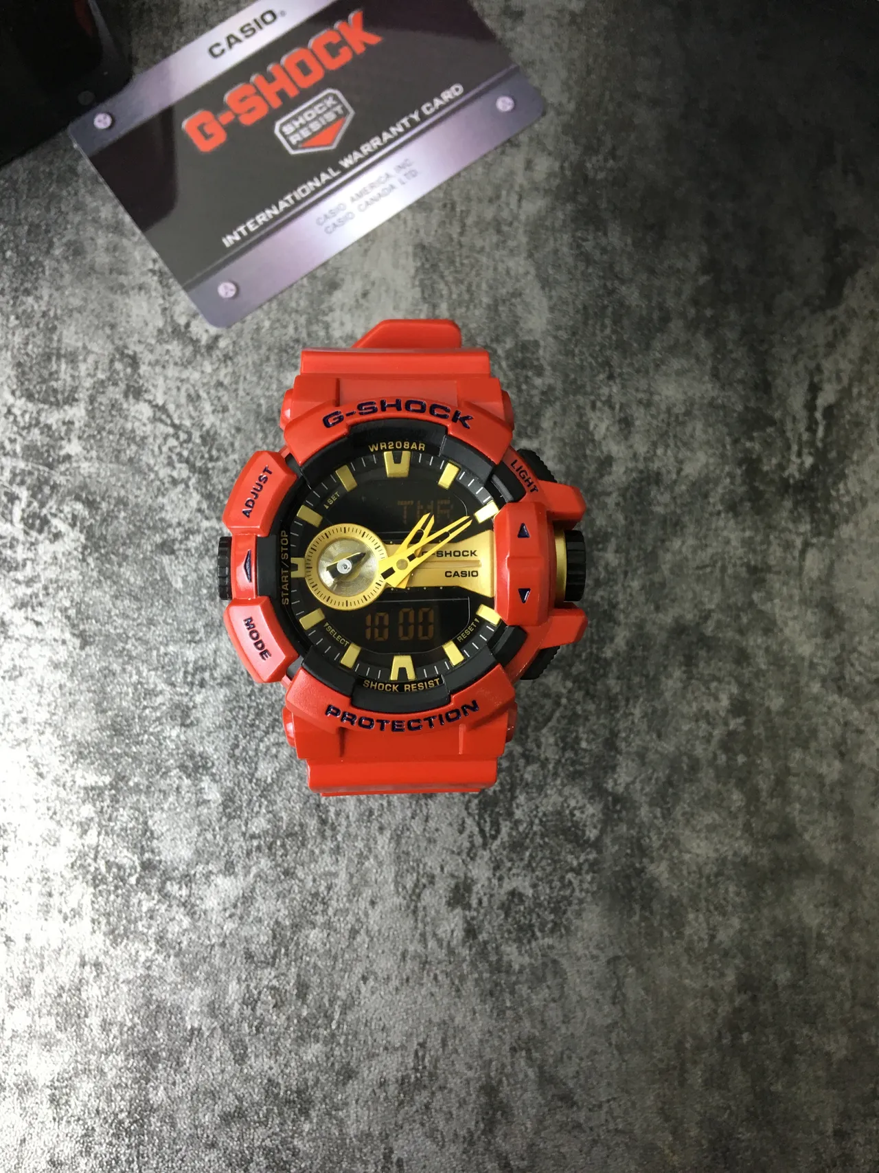 Casio G-Shock GA-100 Reloj Deportivo Rojo y Oro 2