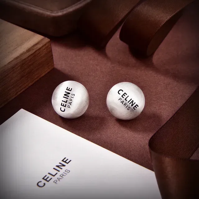 Celine Aretes Esféricos Grabados con Logo en Plata y Oro 2