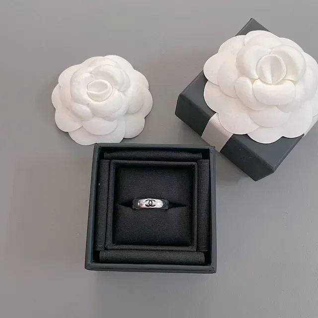 Chanel CC Ring Silver Black Polished Metal Enamel Interlocking Logo Ring 2