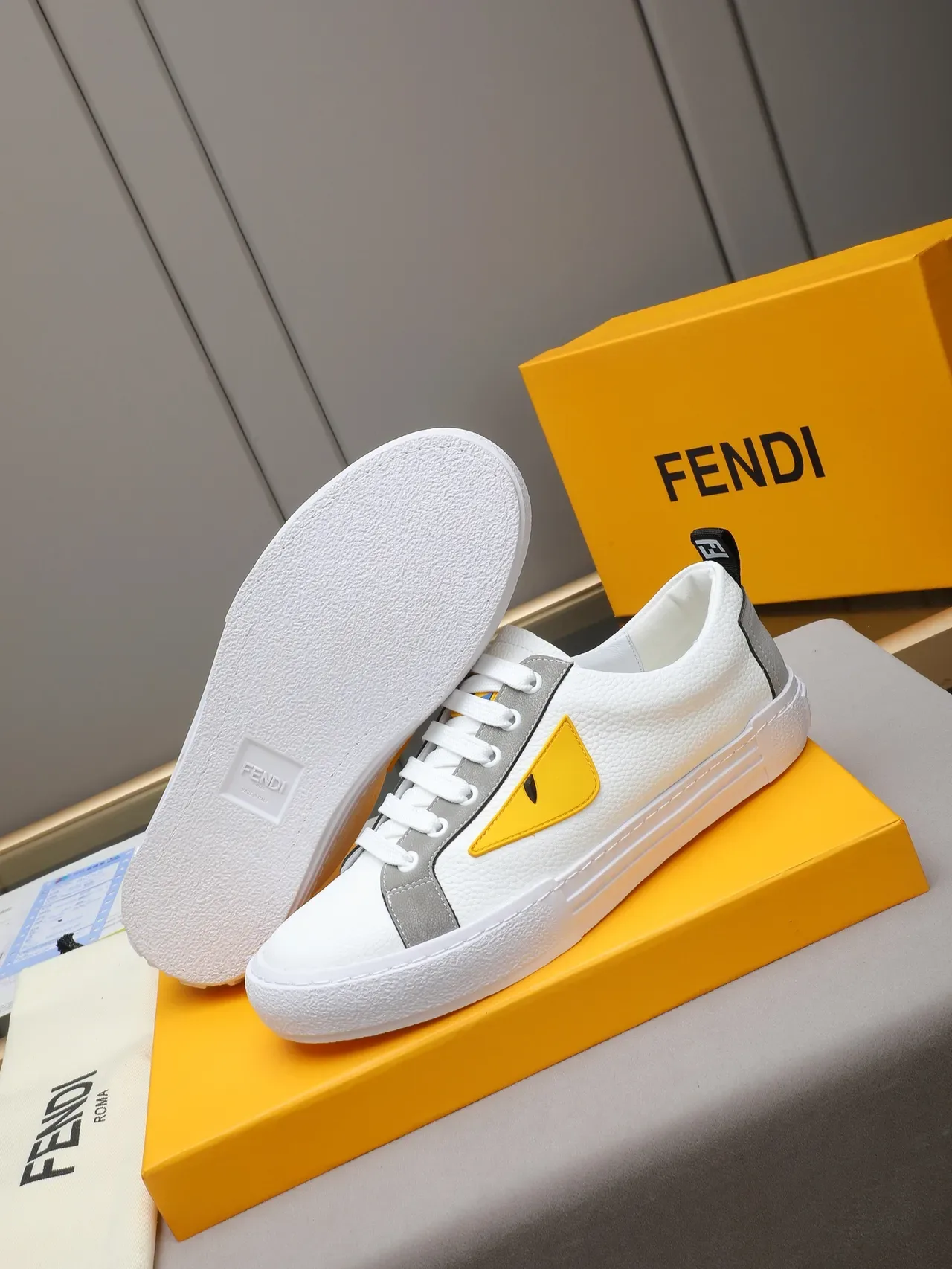 Fendi Monster Eye Sneaker branco cinza amarelo tênis lifestyle 4