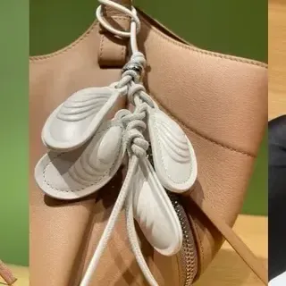 Beige White Sculpted Shell Charms Braided Cord Attachment Handbag