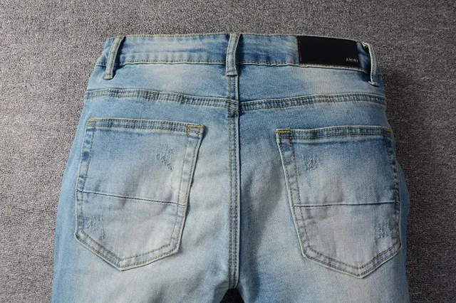 Distressed Slim-Fit Light-Wash Azul jeans 16