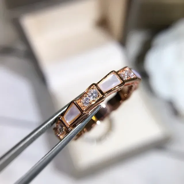 Geometric Channel-Set Opal and Pavé Ring 8