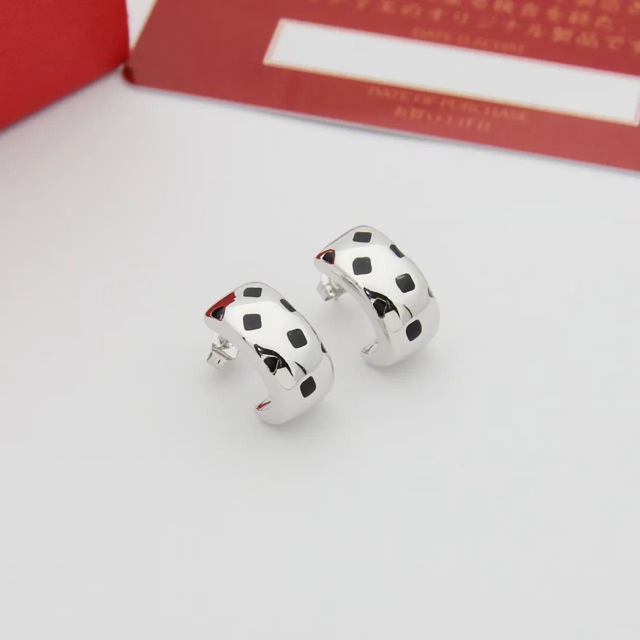 Gold Black Huggie-Style Metallic Earrings 5