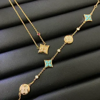 Collier avec chaîne dorée et bleue, pendentifs floraux quatrefoil