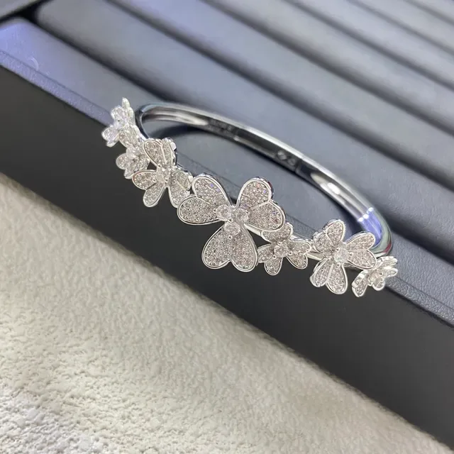 Bracelet en or et argent avec motif floral en pierres pavé-set 6