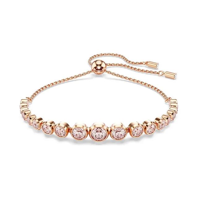 Brincos de coração em tom dourado com cristal rosa e pérola pendentes 10