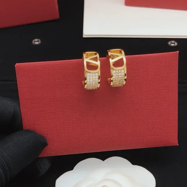 Gold-Tone Pavé Crystal Open Logo Hoop Cuff Earrings 4