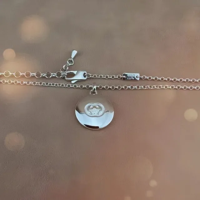 Silver-Toned Engraved Circular Pendant Necklace 5