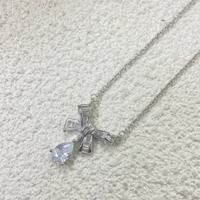 Silver White Bow-Shaped Pendant Baguette-Cut Side Stones Necklace 3