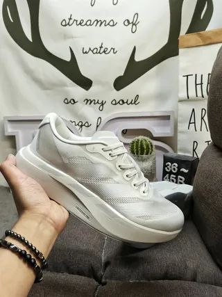 Chaussures de course avec upper tricoté monocrome blanc, semelle intermédiaire en mousse sculptée 5