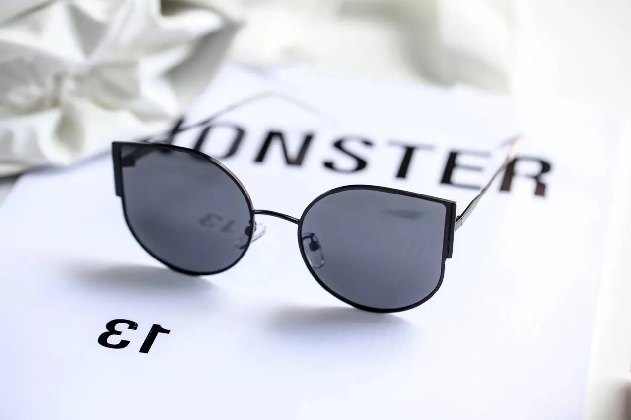 Gentle Monster نظارات شمسية كات آي غير متناظرة سوداء تدرج 4