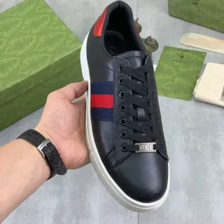 Gucci Ace 黑色皮革 Web Stripe 生活方式运动鞋