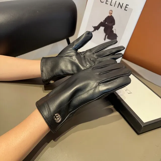 Gucci Guantes de cuero negro y oro suave Interlocking G Hardware 3