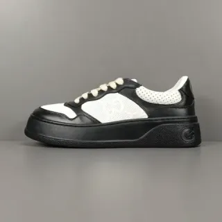 Gucci حذاء رياضي أسود وأبيض منصة جلد مُثقب أسلوب حياة