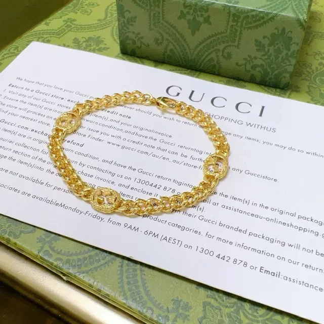سوار Gucci GG Marmont ذهبي سلسلة كرب لينك سميكة مع medallions شعار G متشابك 3
