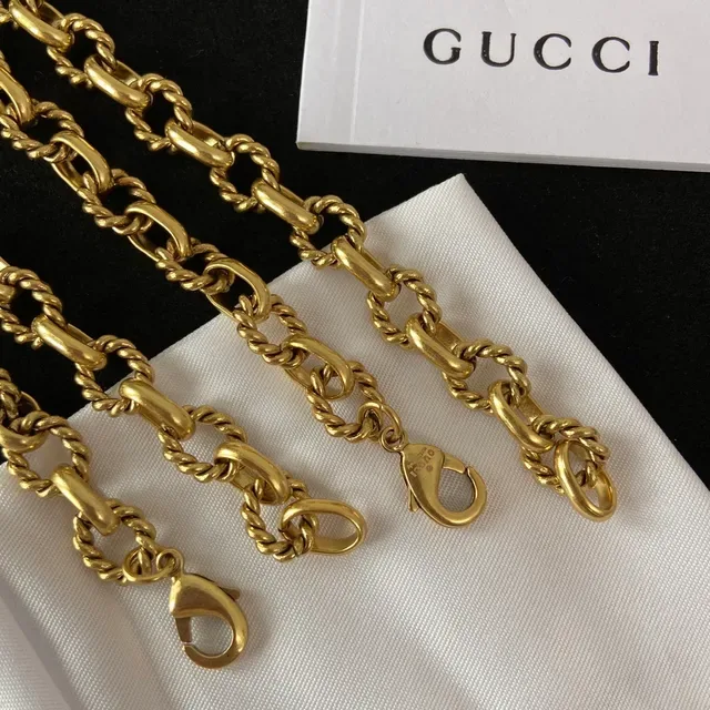 Gucci GG Marmont Cadena con eslabones de cuerda trenzada en tono dorado 2