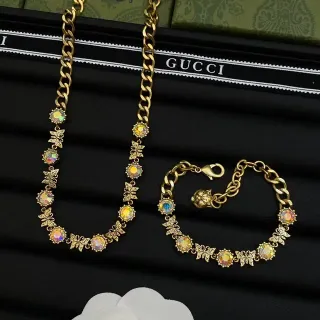 Gucci সোনালি বহুরঙ চেইন ইরিডিসেন্ট ফেসেটেড স্টোন হার