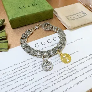 Gucci فضة ذهب زخرفة لفية روابط ثنائي اللون تعاويذ سوار