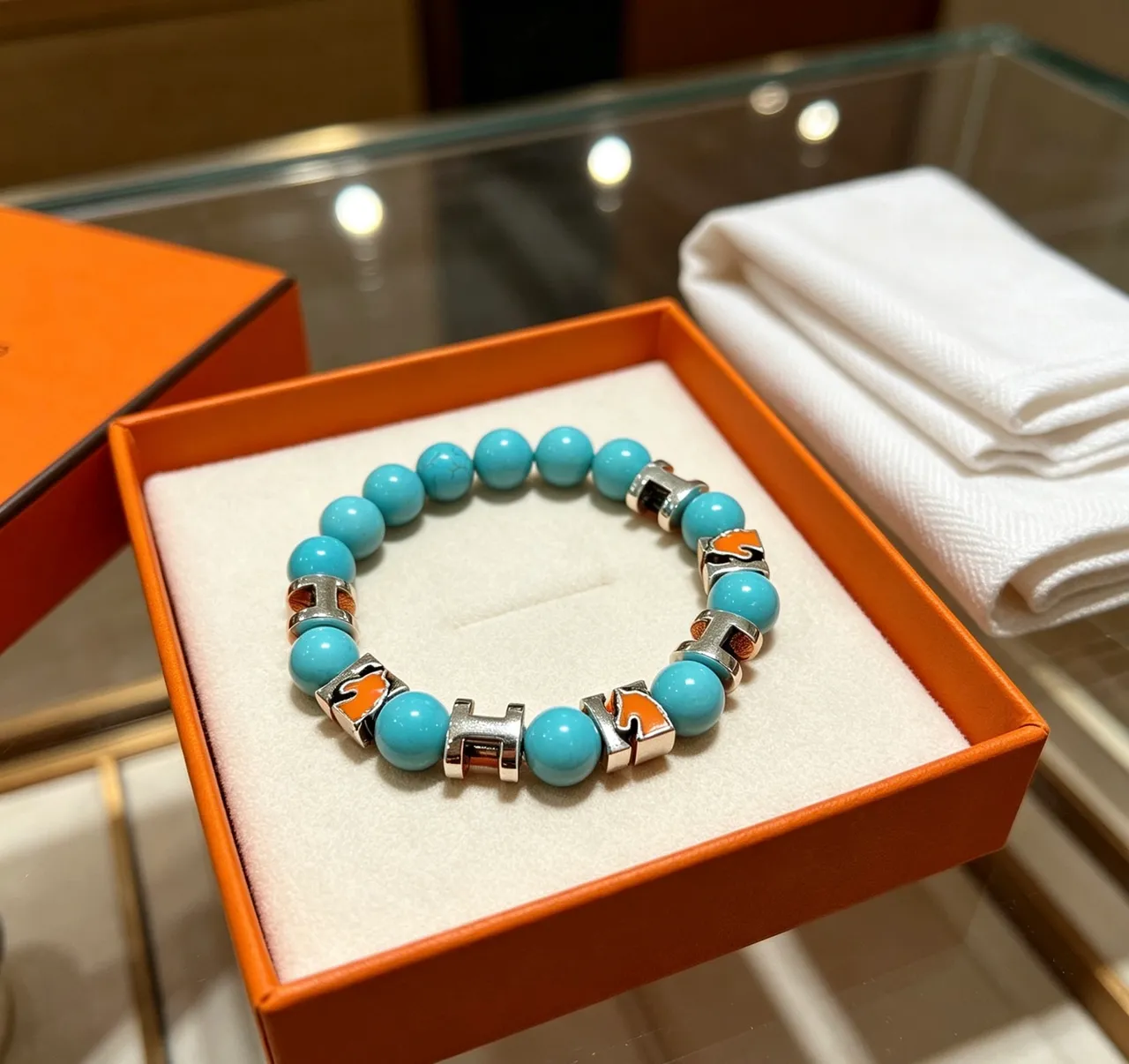 Hermès H-Link سوار أزرق برتقالي بتصميم خرزي 4