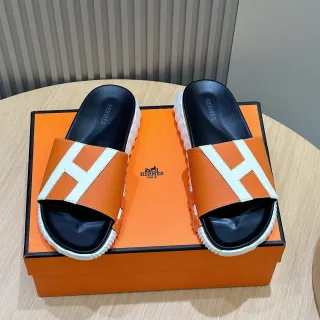 Hermès Oran Slide شرائح جلدية برتقالية وبيضاء